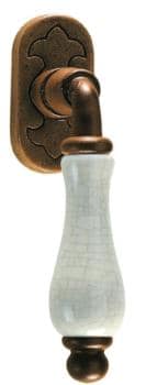 Maniglia in ferro per finestra Galbusera serie Praga DK, finitura speciale e porcellana